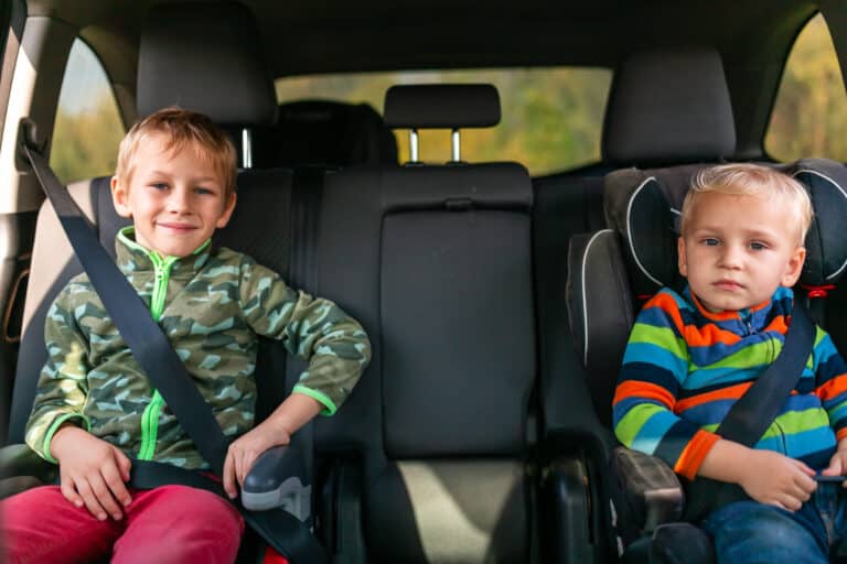 Two,Little,Boys,Sitting,On,A,Car,Seat, Child and Adolescent Safety - Injury in Motor Vehicle Crash